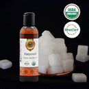 Bottle of Karpuradi Ayurvedic Oil with USDA Organic and OneCert Organic certification logos on a black background.