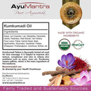 AyuMantra Kumkumadi Oil packaging with ingredients list, certification logos, and product description.