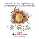 Organic herbs with powder on a white background, featuring AyuMantra branding.