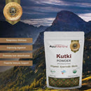 AyuMantra Kutki Powder packaging with mountainous landscape in the background