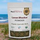 AyuMantra Lavan Bhaskar Powder packaging with a beach background
