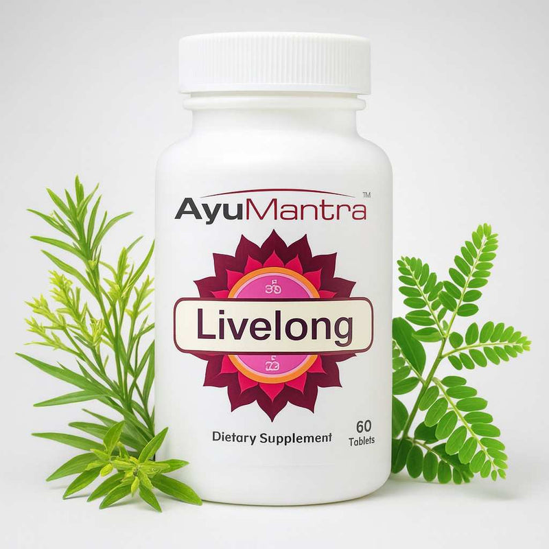 AyuMantra Livelong tablets bottle with fresh green Ayurvedic herbs on a white studio background