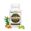 Ayurvedic supplement bottle labeled 'Madhuant' with natural elements on a white background