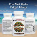 AyuMantra Madhuant Pure Multi Herbs Extract Tablets with a beach background