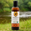 Bottle of Mahamarichyadi Organic Ayurvedic Oil with a natural background
