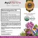 AyuMantra Mahavishgarbha Oil packaging with ingredients list, organic certification logos, and natural elements.