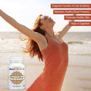 Woman in an orange dress with arms raised next to a bottle of AyuMantra Manjistha supplement.