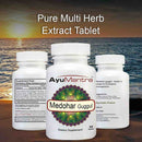 AyuMantra Medohar Guggul supplement bottles with a scenic background