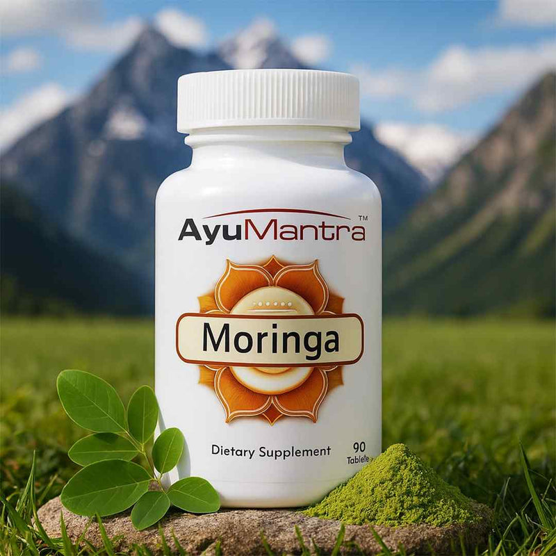 AyuMantra Moringa dietary supplement bottle with a mountainous background