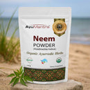 AyuMantra Neem Powder package on a stone with a natural background