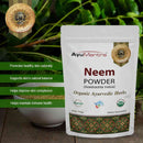 AyuMantra Neem Powder packaging with green leafy background