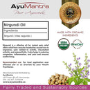 AyuMantra Nirgundi Oil packaging with ingredients list, certification logos, and product description.