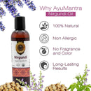 AyuMantra Nirgundi Oil bottle with product features on a white background