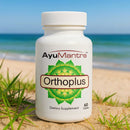 AyuMantra Orthoplus dietary supplement bottle on a beach