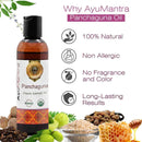 AyuMantra Panchaguna oil bottle with product features on a white background