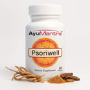 AyuMantra Psoriwell dietary supplement bottle with herbs on a white background