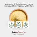 Bowl of organic powder with AyuMantra branding and certification logos on a white background