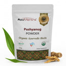 AyuMantra Pushyanug Powder packaging with herbs on a white background