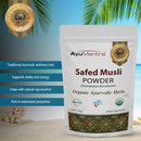 AyuMantra Safed Musli Powder packaging with product details on a scenic background