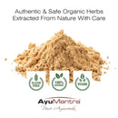 Pile of organic powder with AyuMantra branding and certification logos on a white background