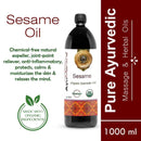 Bottle of AyuMitra Sesame Organic Ayurvedic Oil with product details on a white background