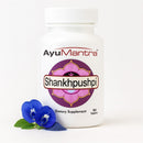 AyuMantra Shankhpushpi dietary supplement bottle with a blue flower on a white background
