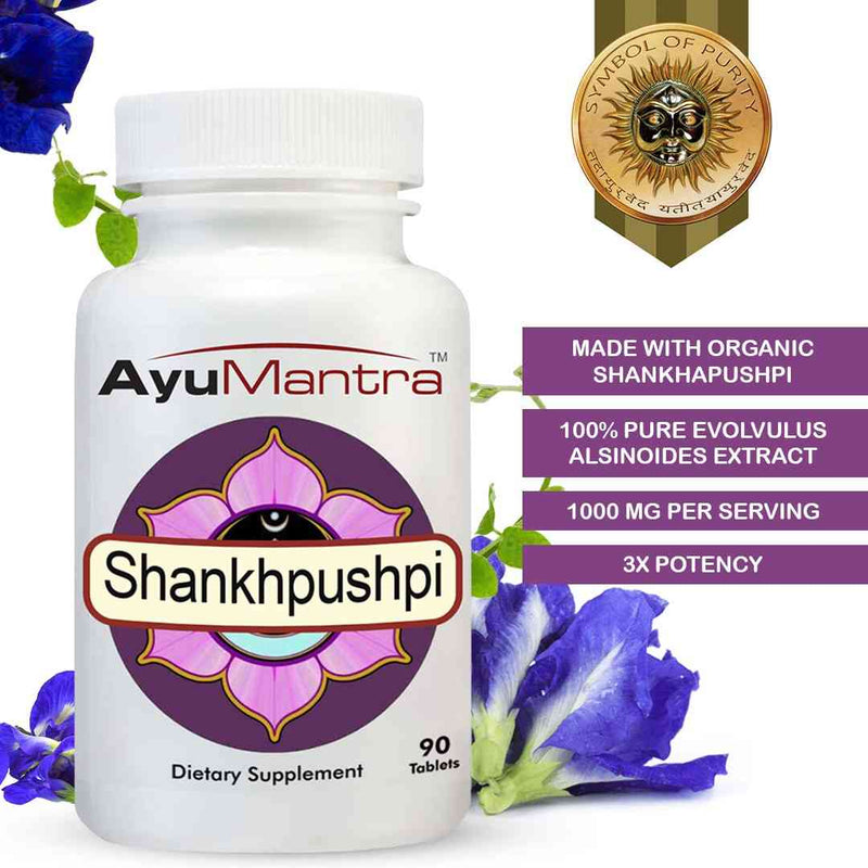 AyuMantra Shankhpushpi dietary supplement bottle with purple flowers and certification emblem on a white background