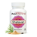 AyuMantra Shatavari dietary supplement bottle with herbs and powder on a white background