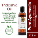 Bottle of Tridoshic Ayurvedic oil with text highlighting its benefits on a white background.