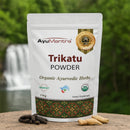 AyuMantra Trikatu Powder packaging with organic certification logos on a natural background