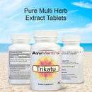 Three AyuMantra Trikatu tablets bottles on a beach, highlighting supplement facts and usage.