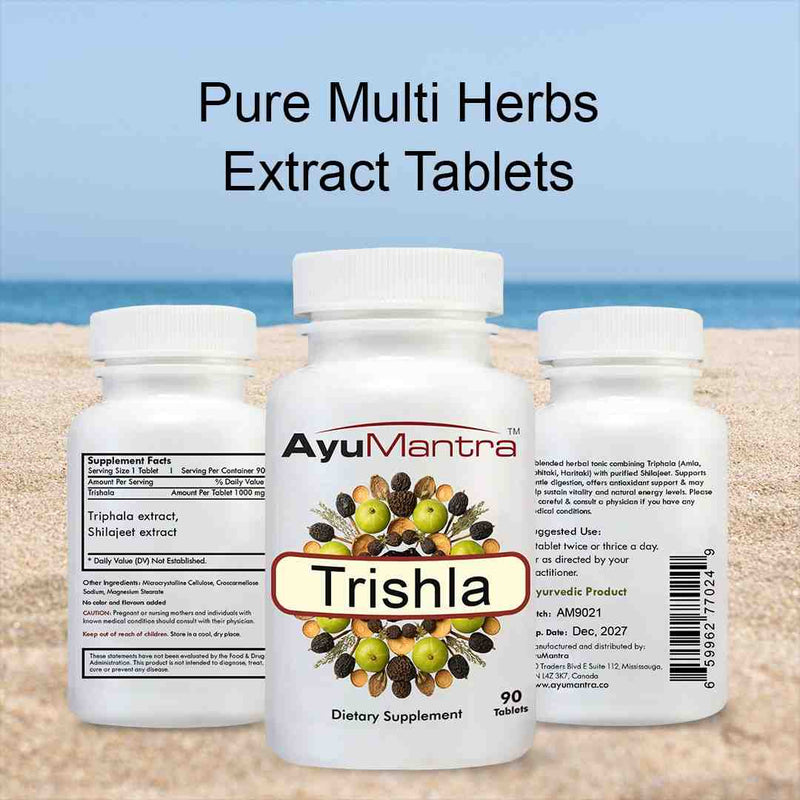 AyuMantra Trishala tablets front and back bottles on a beach showing supplement facts.