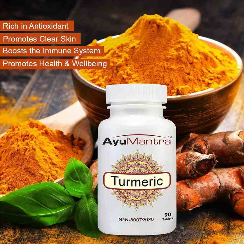 Ayumantra Turmeric tablets bottle in front of turmeric powder bowl promoting antioxidant support.