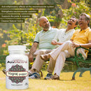 AyuMantra Yograj Guggul tablets bottle beside happy senior men sitting on a park bench