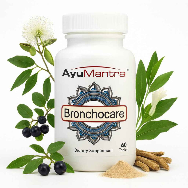 Bronchocare tablets bottle with Ayurvedic herbs, berries and powder on a white background.