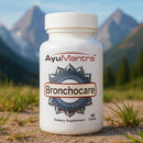 Ayumantra Bronchocare tablets bottle on a mountain landscape, dietary supplement 60 tablets.