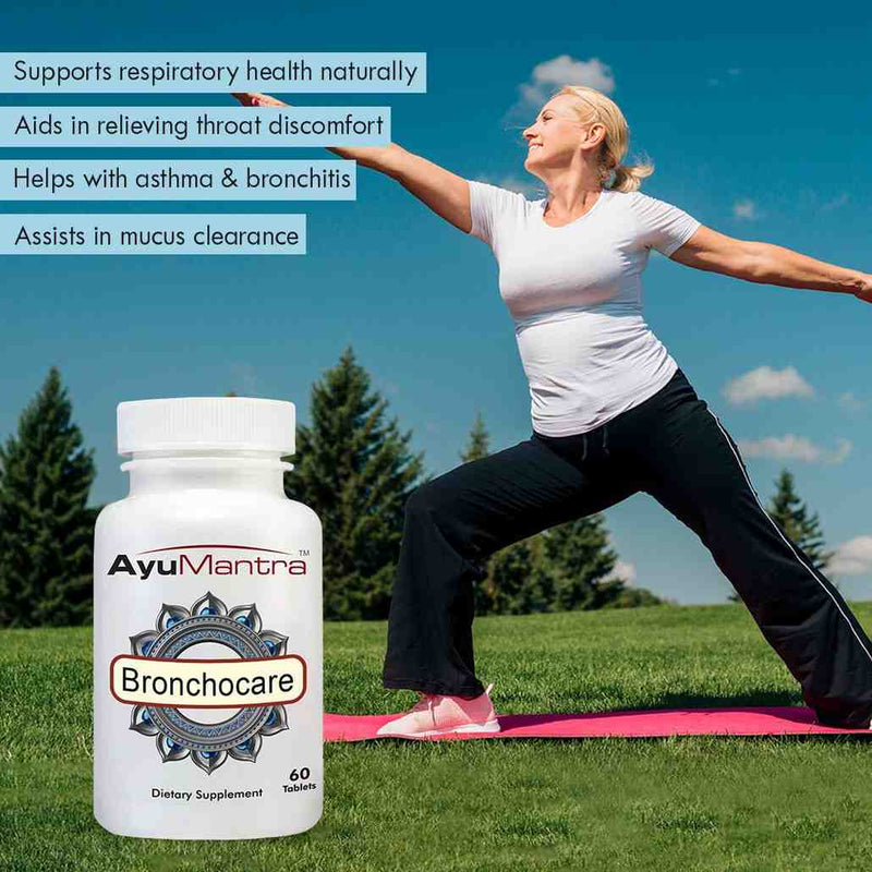 Woman doing yoga outdoors with Ayumantra Bronchocare tablets bottle in the foreground.