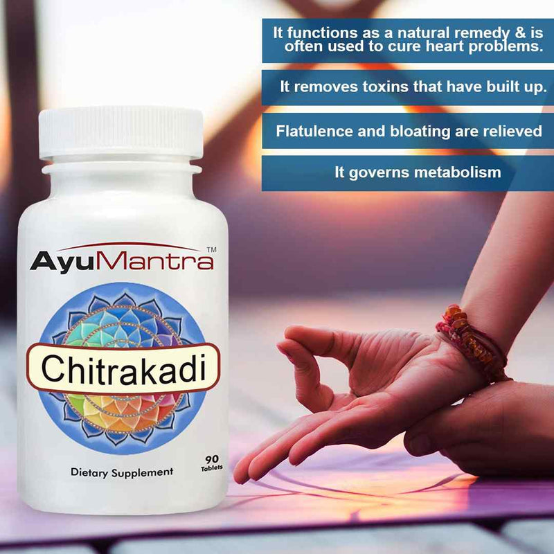 A bottle of AyuMantra Chitrakadi Vati tablets beside a person doing yoga at sunset with benefit text overlays.