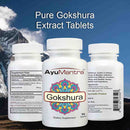 Three AyuMantra Gokshura tablets bottles displaying the front label, supplement facts, and usage text.