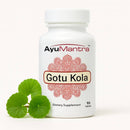 Ayumantra Gotu Kola tablet bottle with fresh gotu kola leaves on a white background
