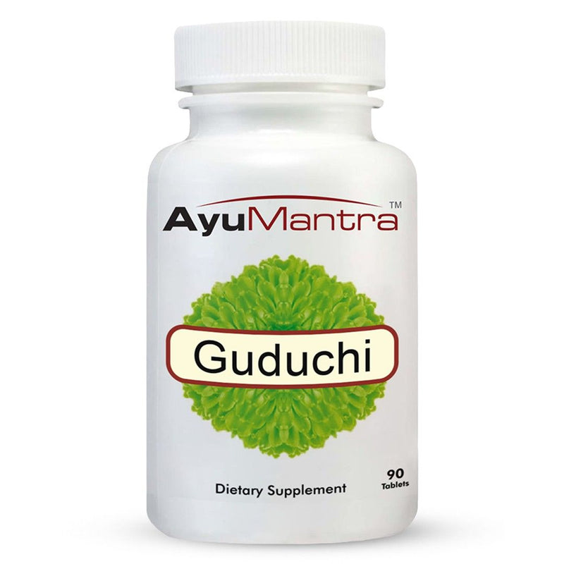 Front view of AyuMantra Guduchi tablets bottle with green herbal emblem on white background