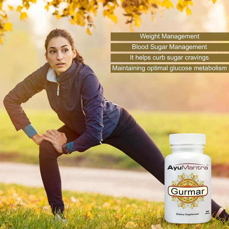Woman stretching outdoors with AyuMantra gurmar tablet bottle shown for wellness support.