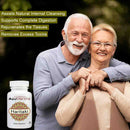 Senior couple smiling with AyuMantra Haritaki tablets bottle promoting digestion support