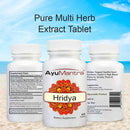 Front and back Ayumantra Hridya tablets bottles showing supplement facts over a beach backdrop