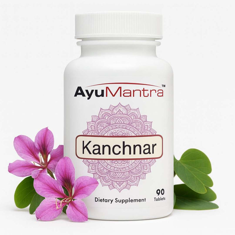 Kanchnar tablets bottle on white background with pink flowers and green leaves, AyuMantra herbal tablets