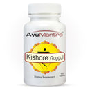 Front view of Ayumantra Kishore Guggul tablets bottle showing the yellow mandala label.