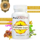 Ayumantra Kishore Guggul tablets bottle with organic herbs and purity seal badge.