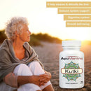 Woman sitting outdoors with AyuMantra Kutki supplement bottle