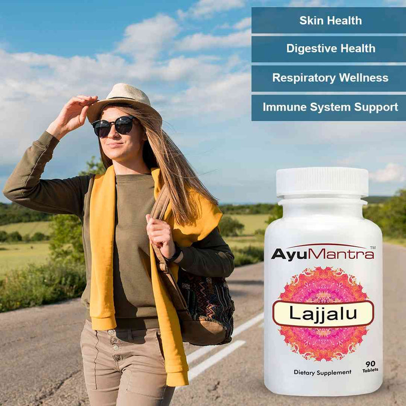 Woman on a road trip with an AyuMantra Lajjalu supplement bottle.