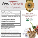 AyuMantra Pure Ayurveda supplement label with herb extract and certification logos.